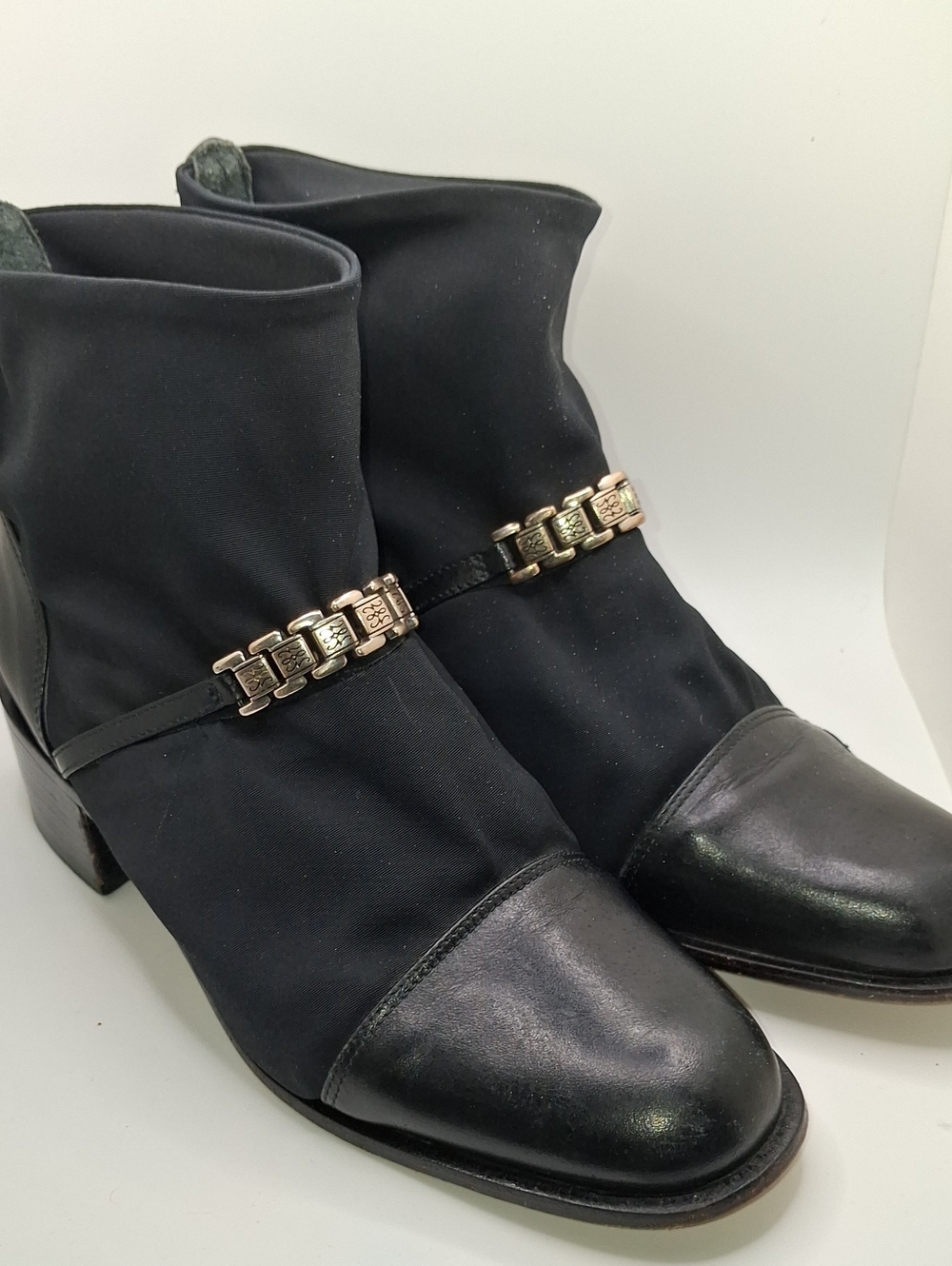 Brighton Black Ankle Booties with Gold Chain Accent